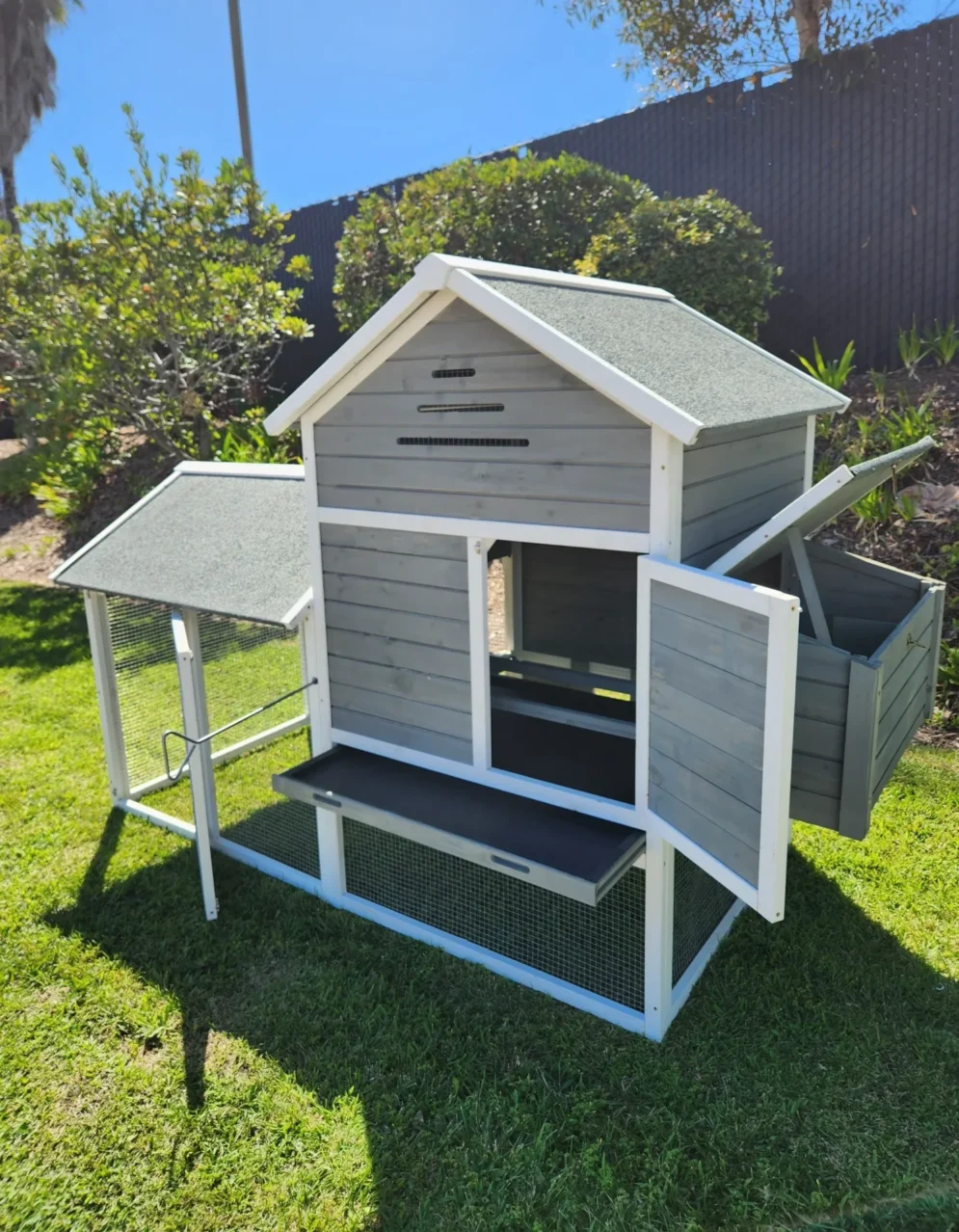 wooden chicken coop with attached run